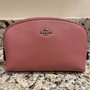 Pink metallic Coach cosmetic bag. Never used!